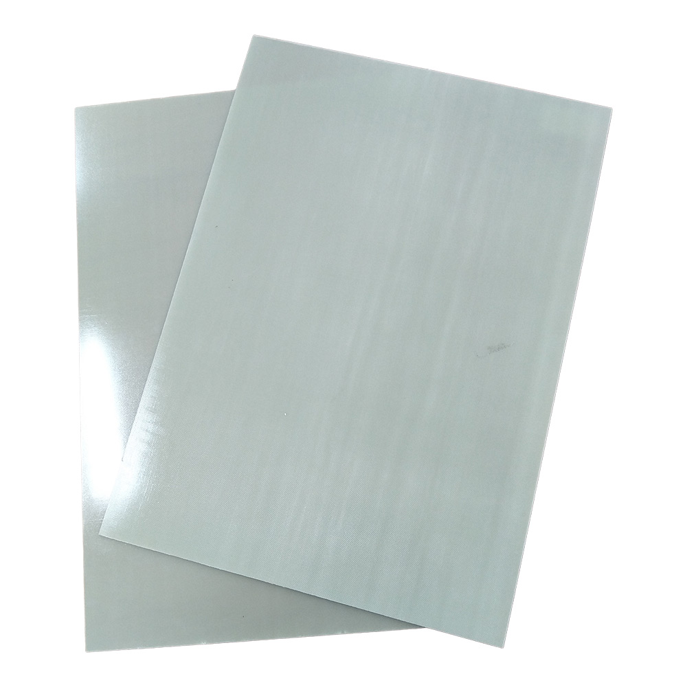 Two stacked light-grey NEMA G7 silicone glass laminate sheets for high-temperature electrical insulation